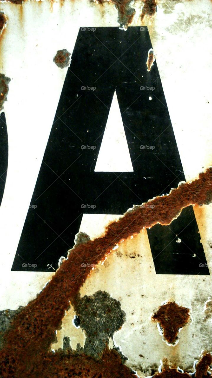 rusty sign letter A