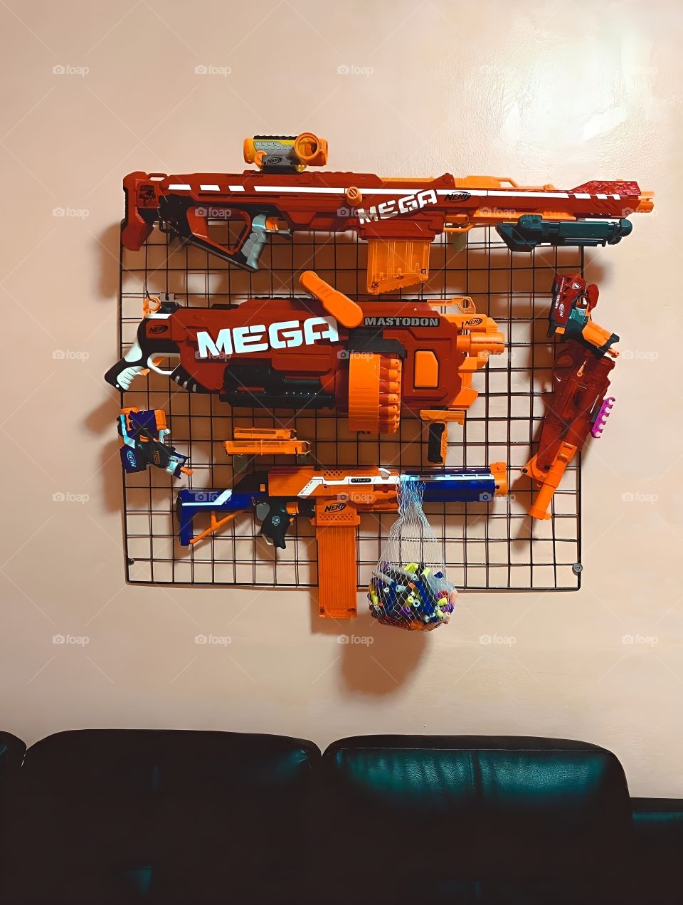 set of mega water gun on the wall