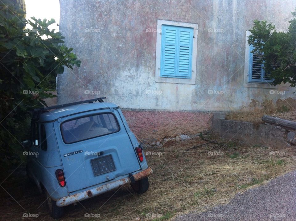 old car and house