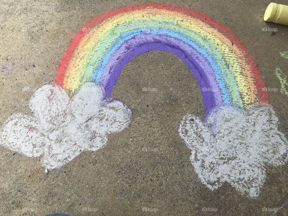 Playing with sidewalk chalk 