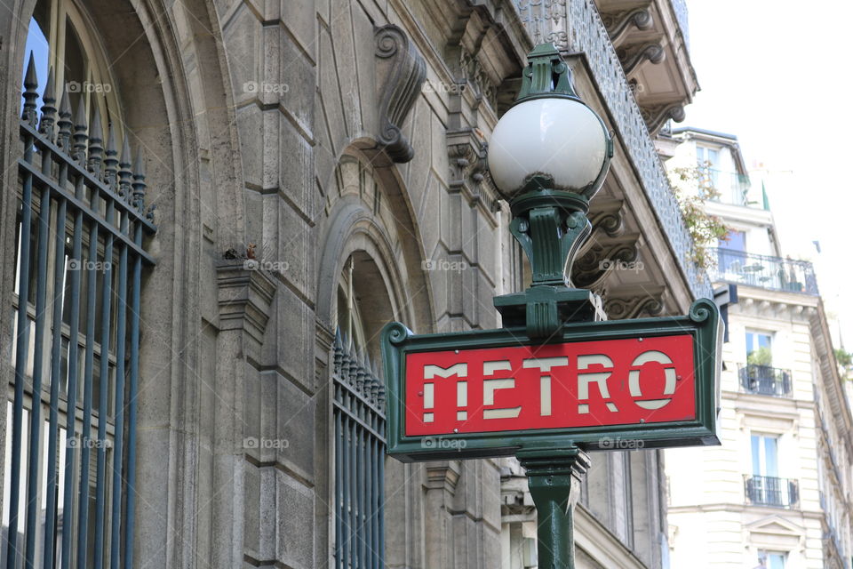 Metro sign along street in Paris, France