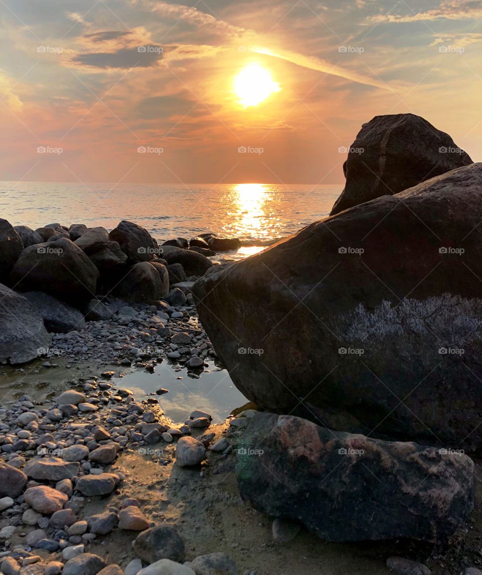 Rocky beach at sunset