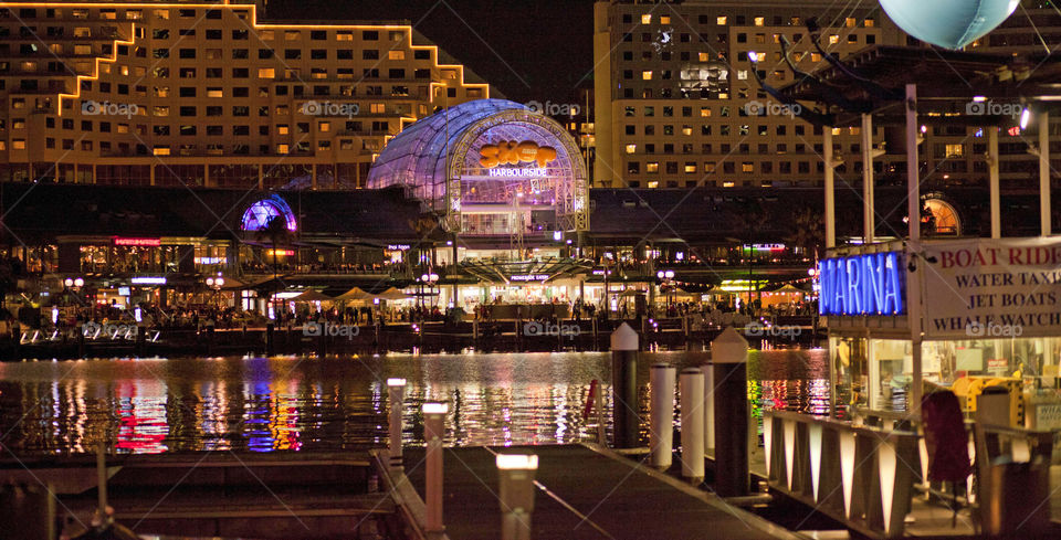 City night lights reflecting on water, Darling Harbour, Sydney Australia, NSW