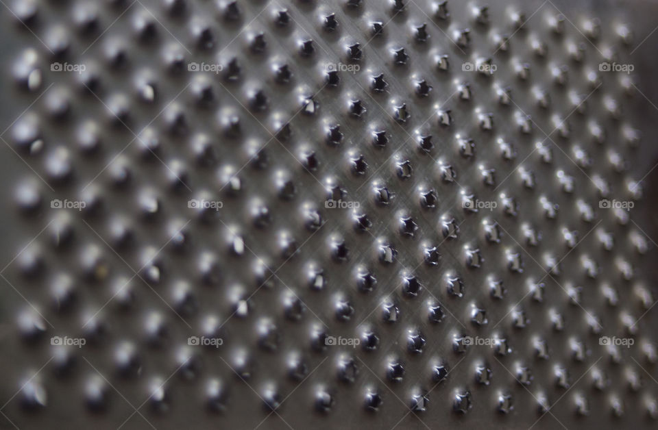 Close up of metal grater grid