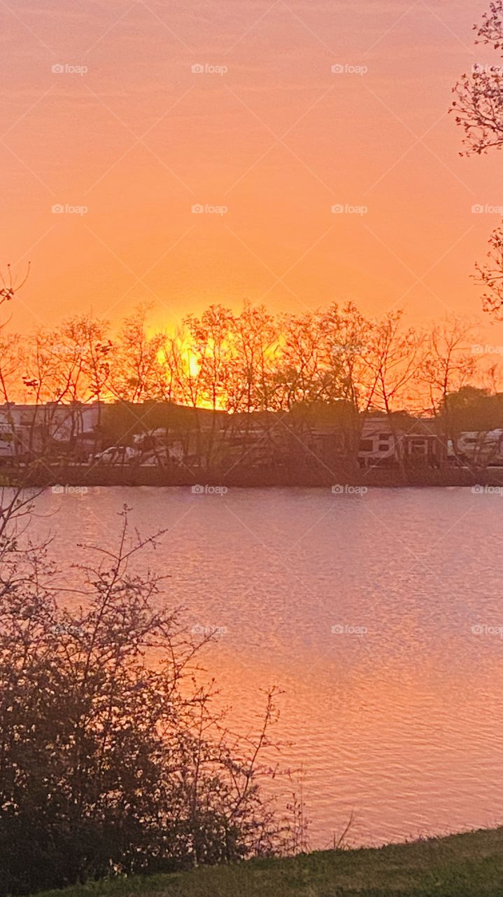 3.7.20 evening sunset by surprise. We have been docked in by clouds for 3 days and I was moving around and peeked out the Bay Window and a Slim window of Sun jumped up grab phone and out the door and this was first pic of 4.