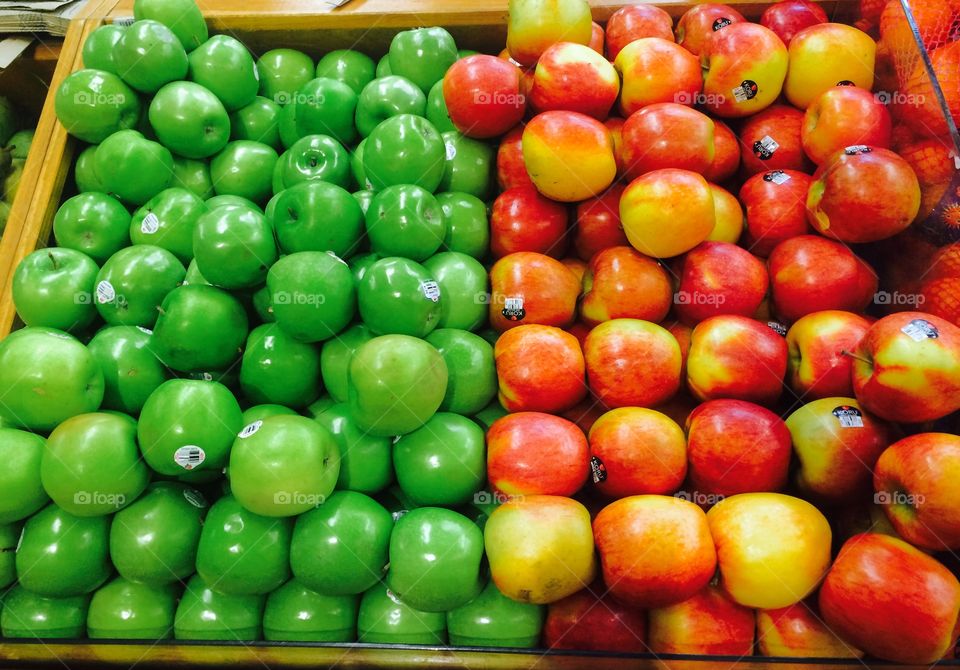  Red and green fresh apples in market for sale