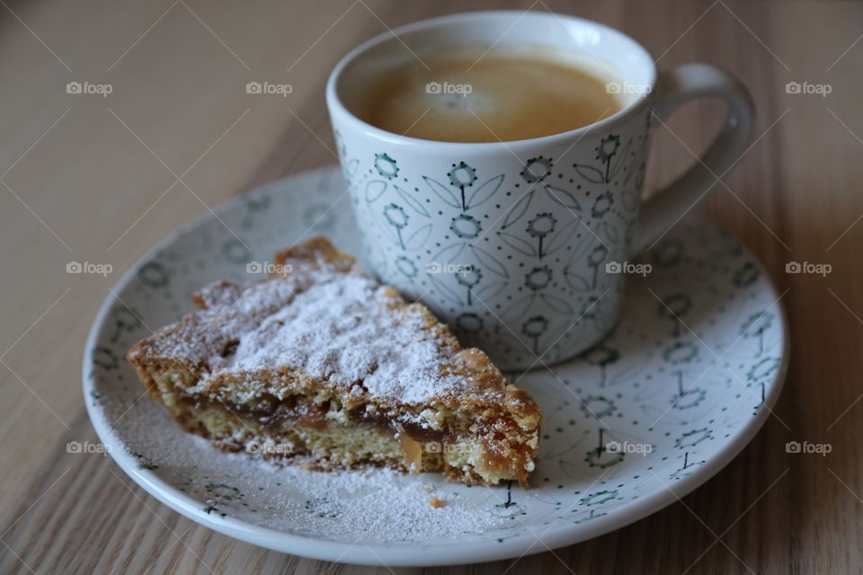 Morning coffee with a biscuit