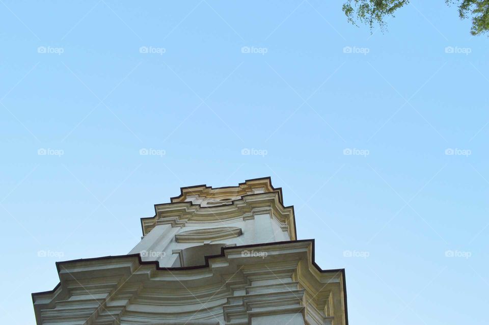 Clear blue sky above the historic church in Poland