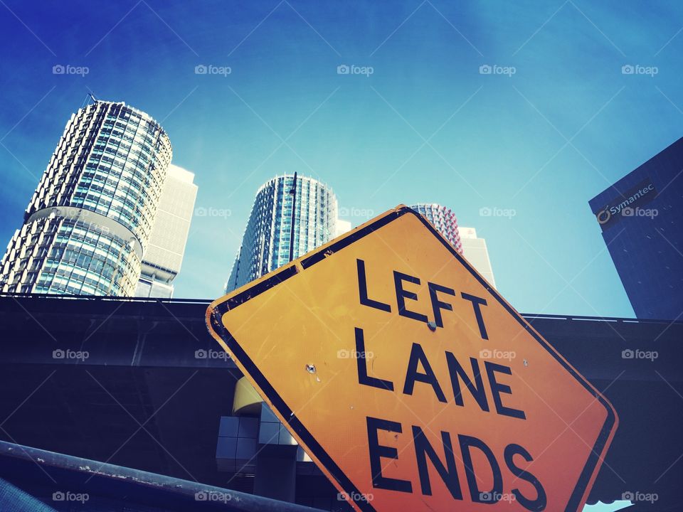 Left lane ends - city views 