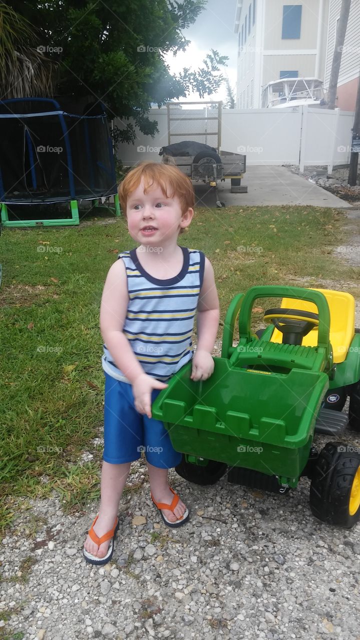 a boy and his tractor