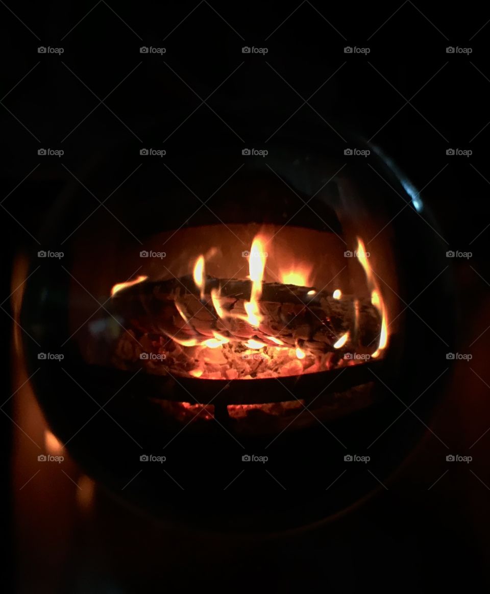 Wood burning stove in lensball