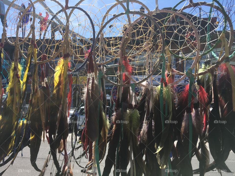 Dream catchers for sale in the market square. Indigenous art
