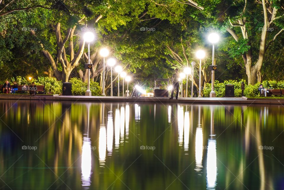 Reflection of light bulb in water