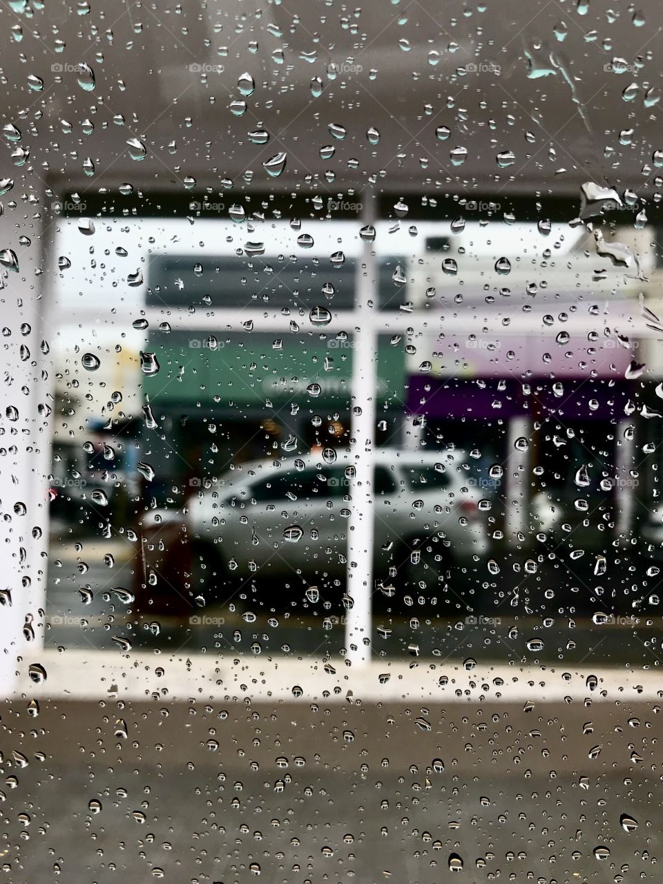 Mirrored car in the rain