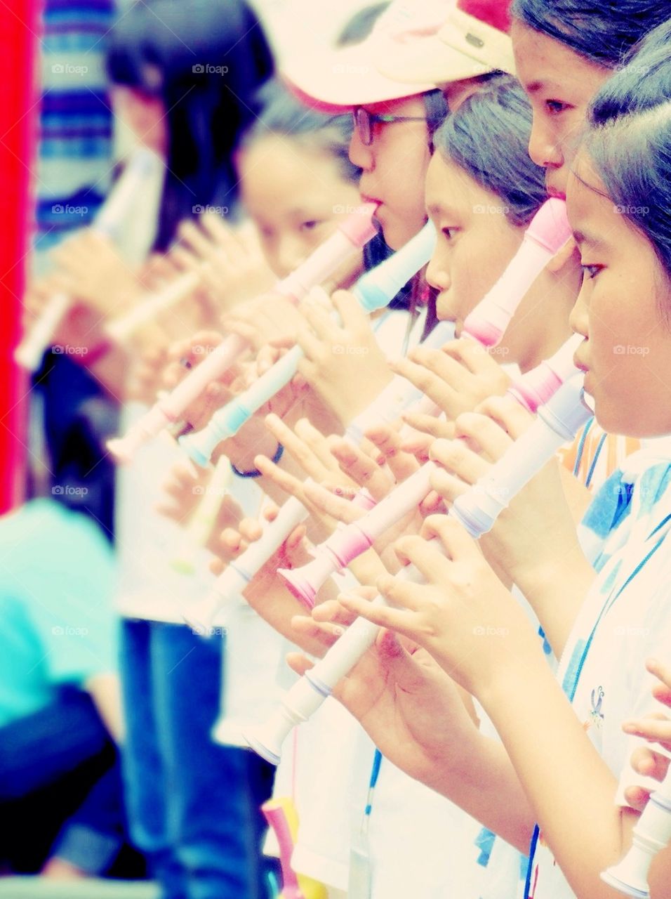 Students playing the recorders