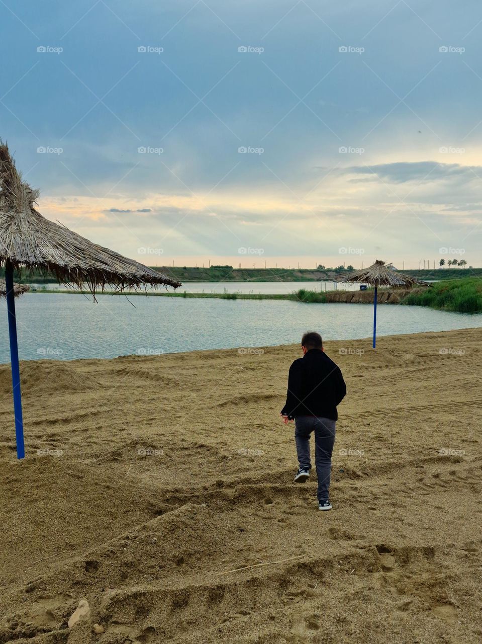 happy to be on the beach of Lake Ghioroc