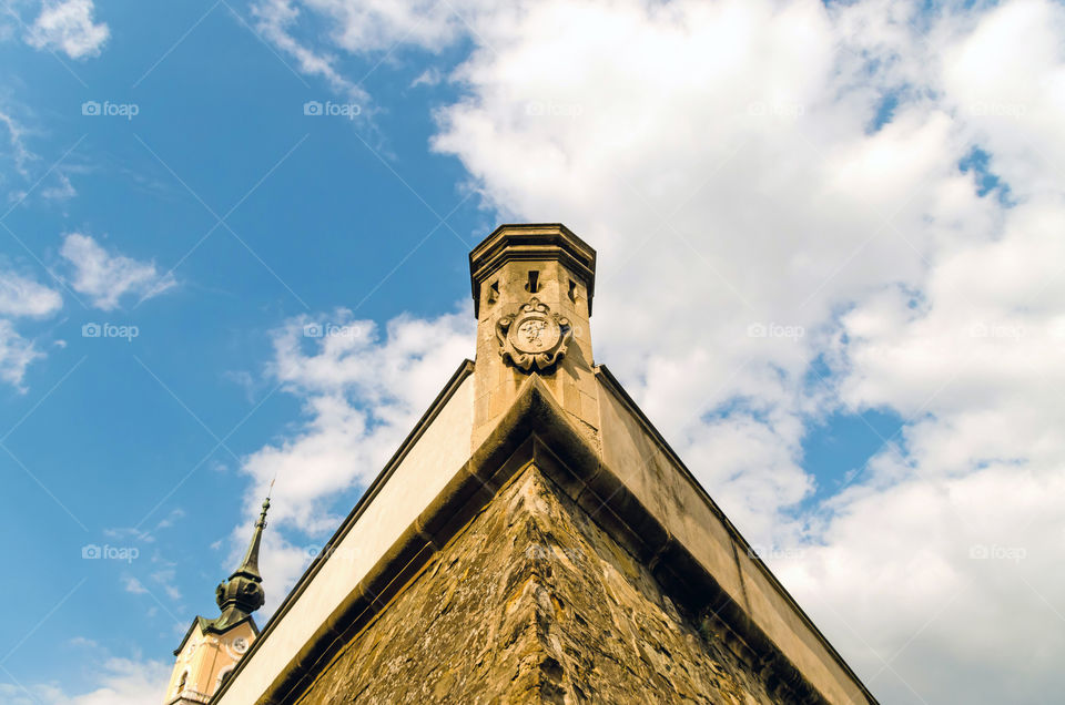 Low angle view of fortification wall against sky.