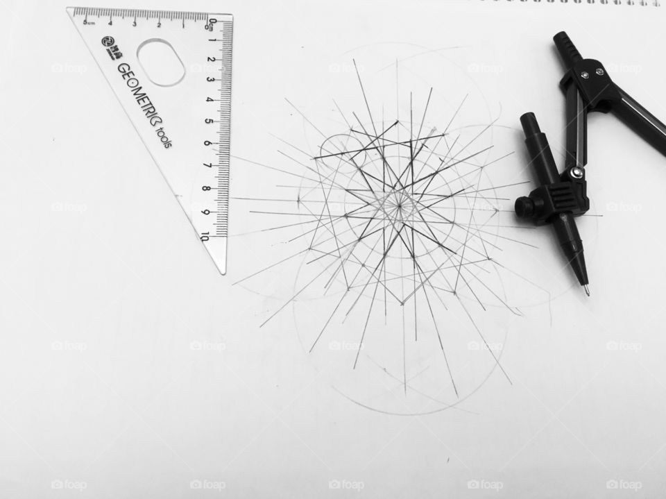 Drawing a geometry 12 point star. Black and white 