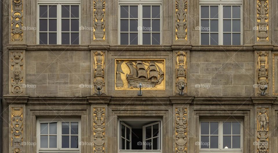 beautiful facade of a tenement house on the market square in Wroclaw