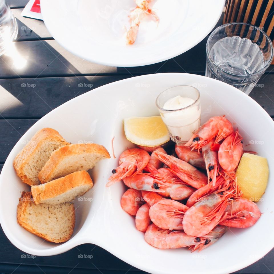 Summer food with fresh shrimps with bread, mayones