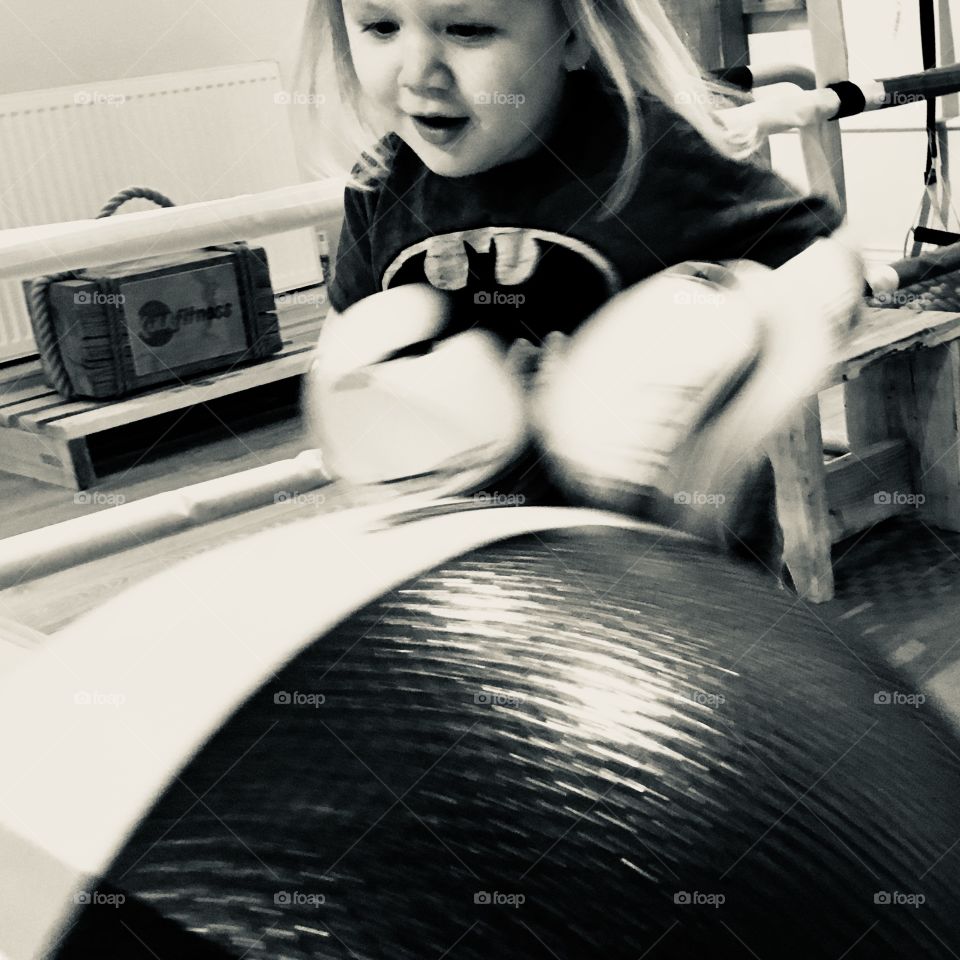 Batman in training, gloves are on and training is the focus. My son is warming up. 