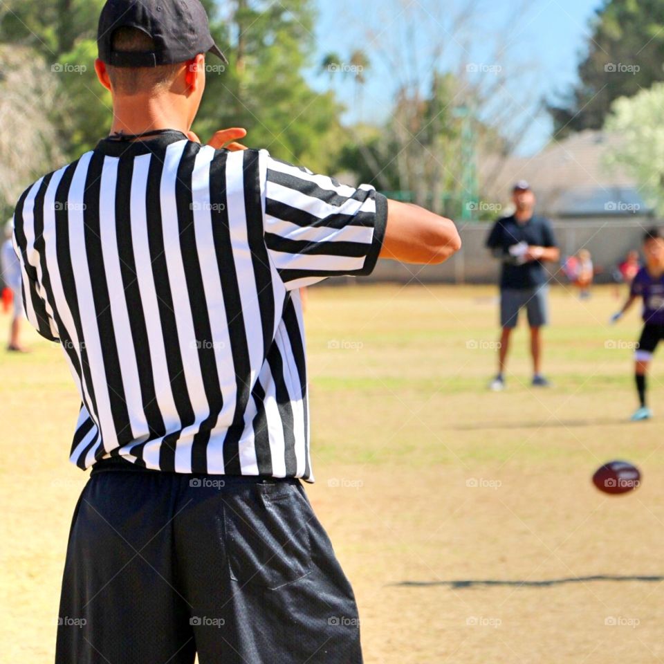 Referee at football game