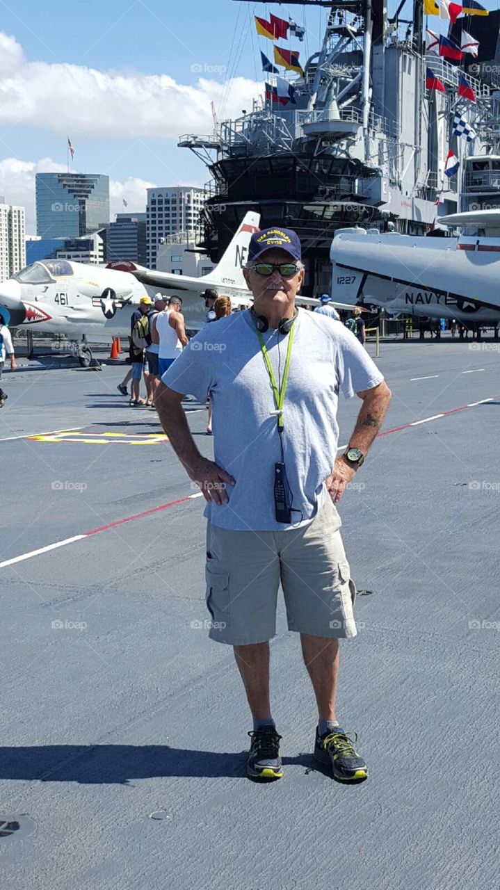 my father. this is my father retired navy vet visiting a retired aircraft carrier in San Diego California