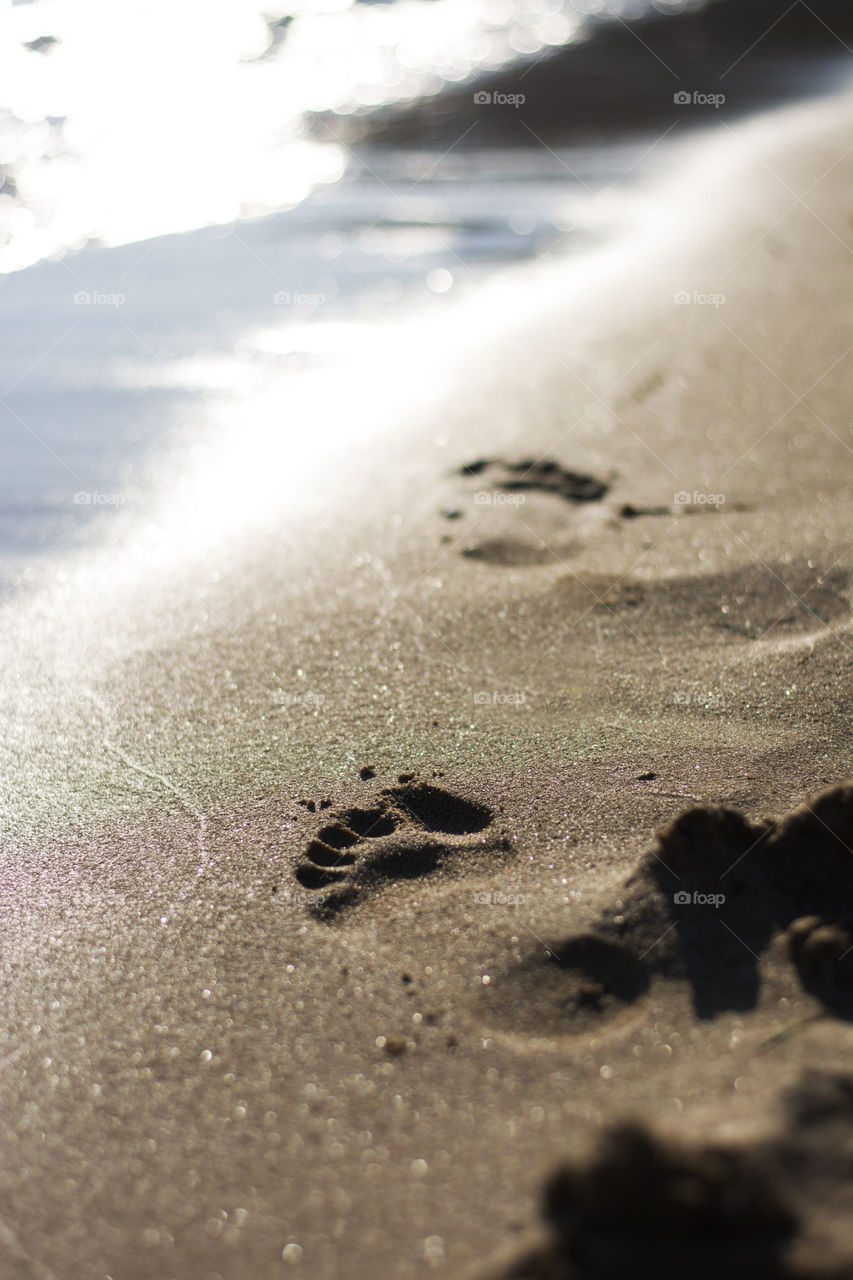 footprints in the sand. footprints in the sand on the beach