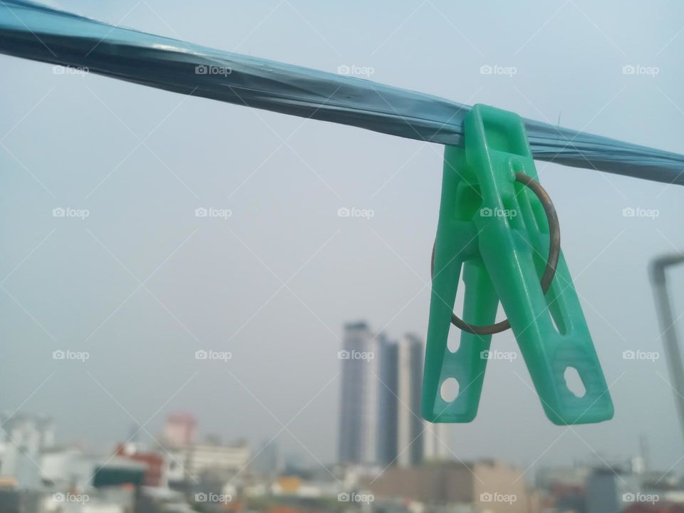 clothespins on plastic rope