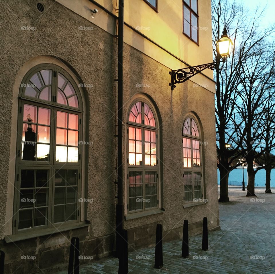 Sunset reflection in windows at Stockholm harbour 