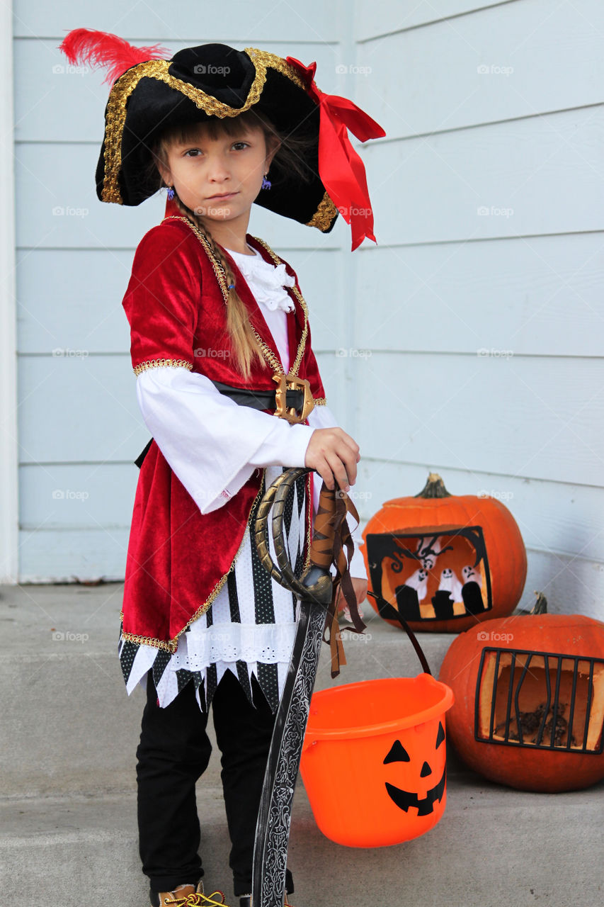 Little girl dressed up as pirate