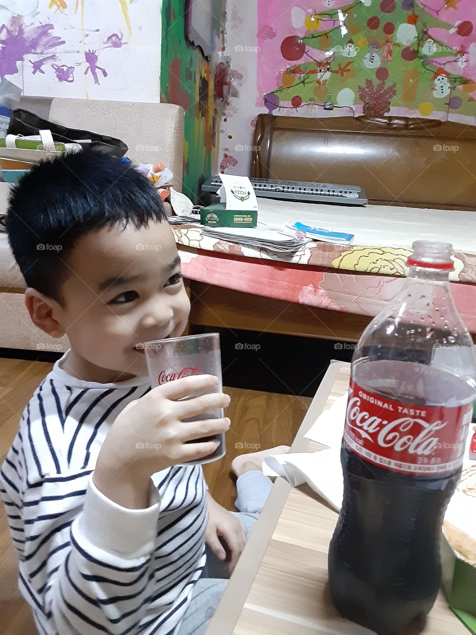 an happy smile with coca cola