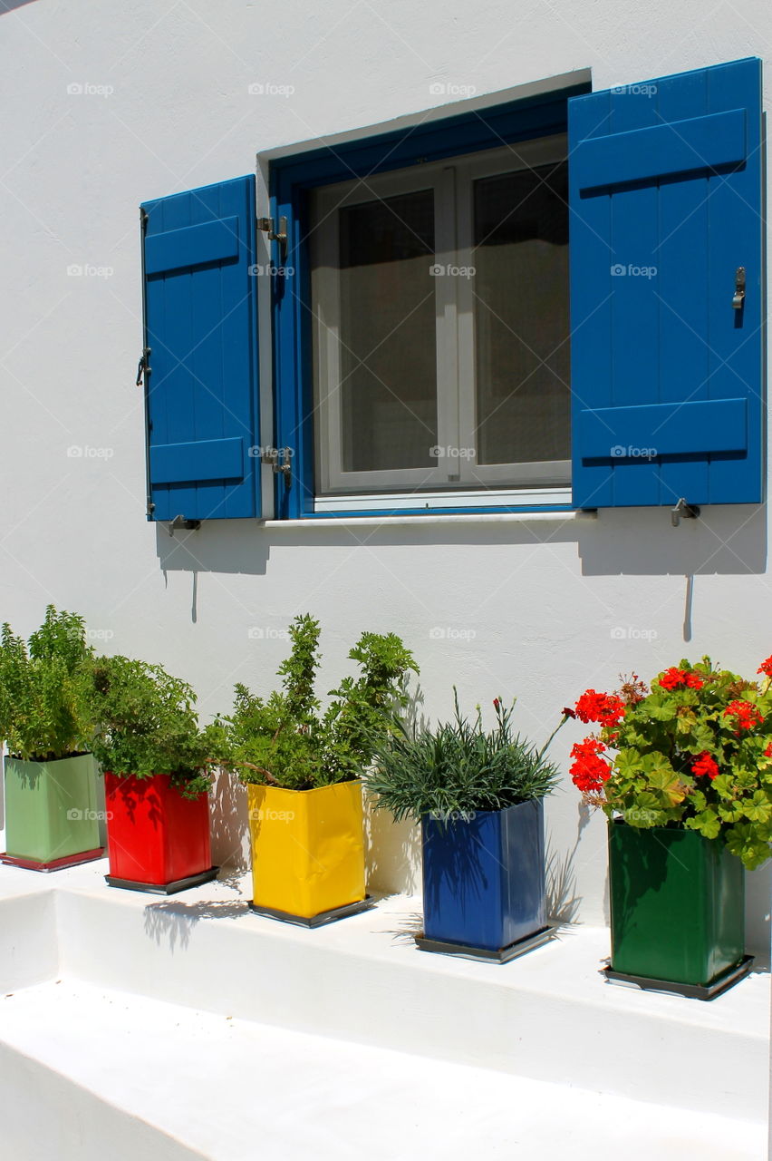 #traditional village #flowers #window #greek Island #Greece