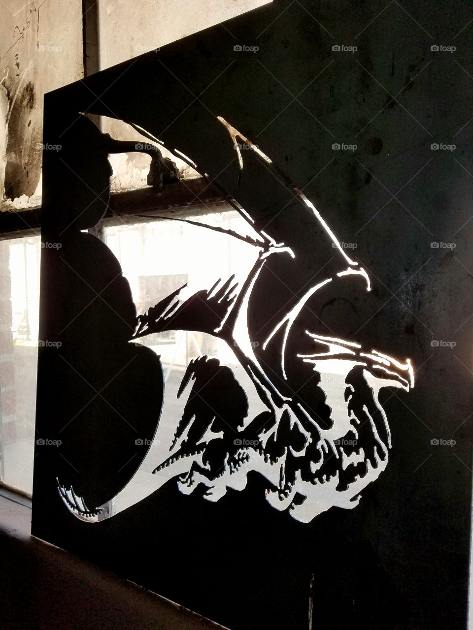 dragon metal sign