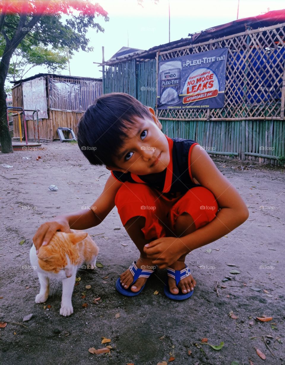A boy and A Cat