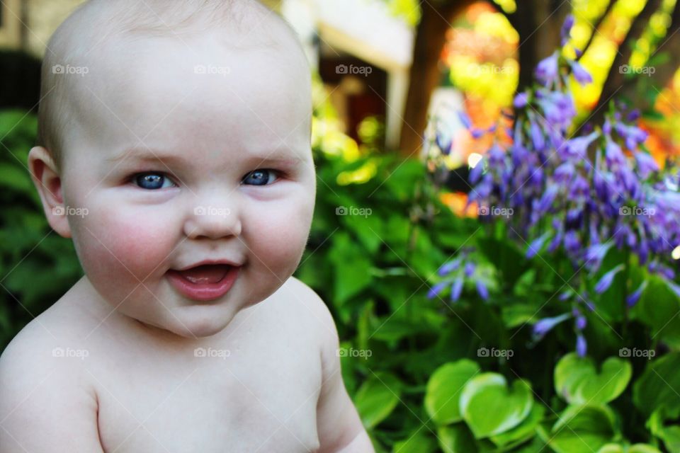 Grinning amongst the flowers