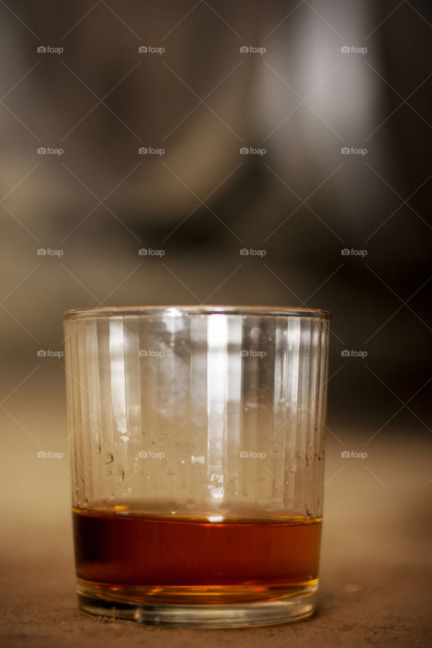 glass of whiskey. glass of whiskey neat without ice closeup