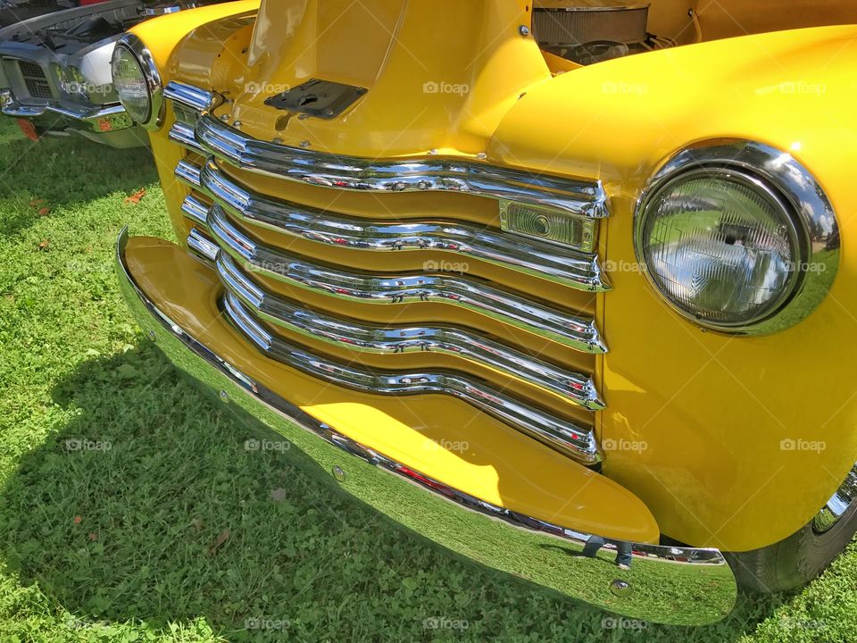 Bright 
Yellow chevy car side grill view