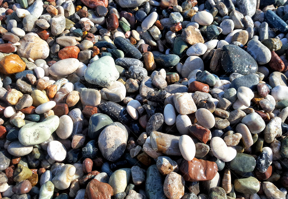Close-up of stones on the seaside