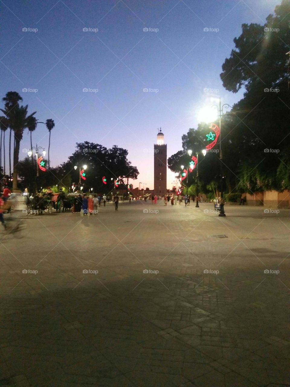 Beautiful minaret mosque at night in marrakech city in Morocco