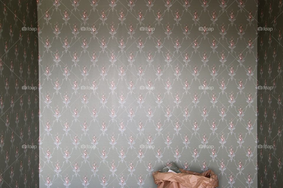 Room with green wallpaper