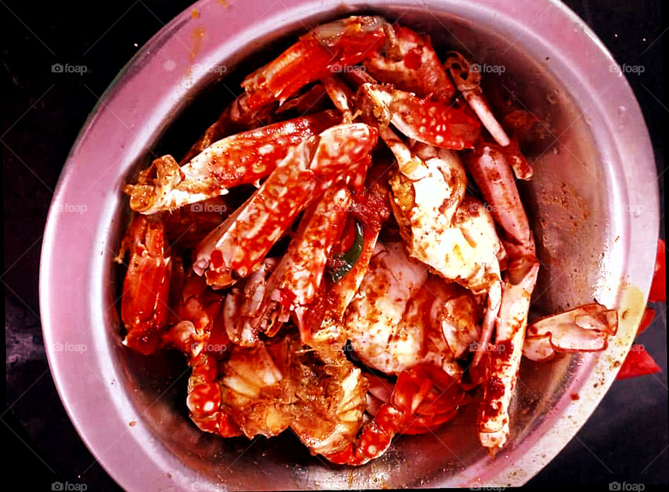 A spicy crab curry cooked with hot Indian spices, sliced red onion, and sliced potatoes.Mouthwatering...