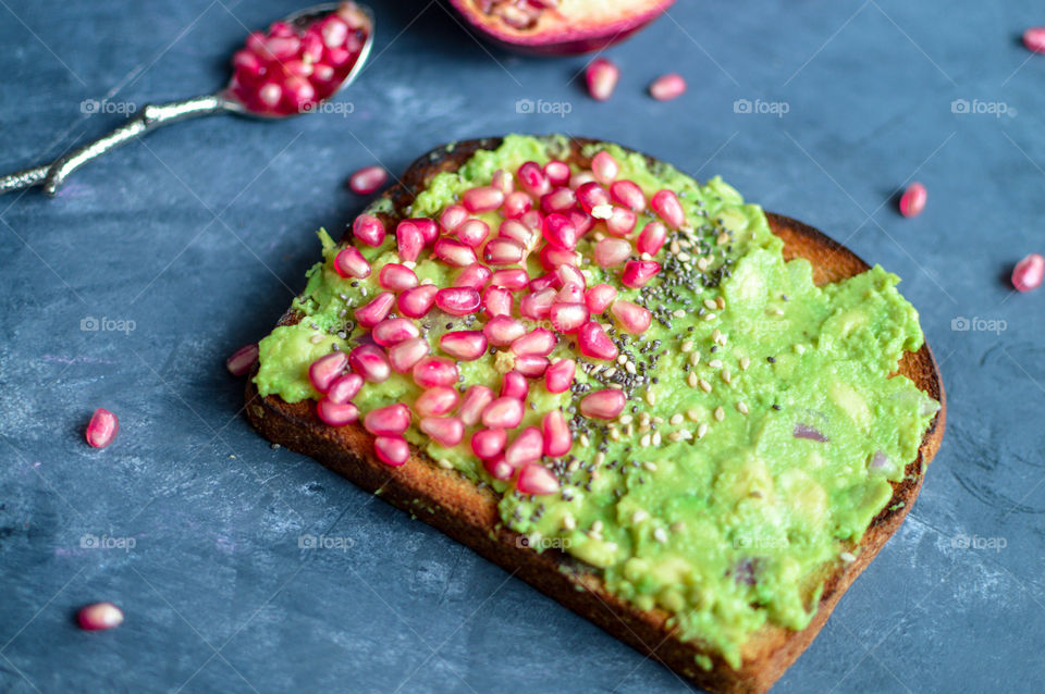 Healthy and delicious avocado spread with pomegranates is our favourite on brown bread. Never skip a breakfast.