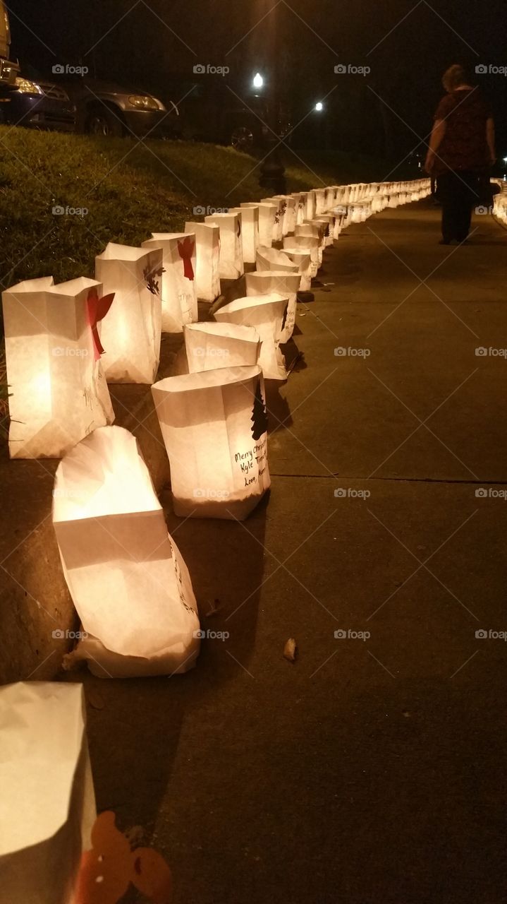 Christmas Eve Luminaries. Holiday messages on luminaries around Spring Bayou, Tarpon Springs Fl