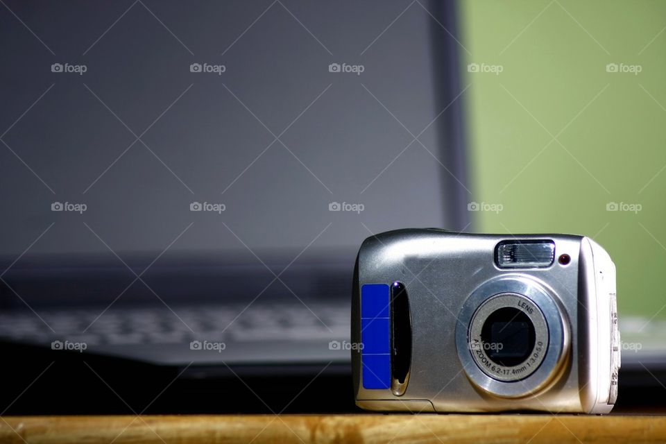digital camera and a laptop computer