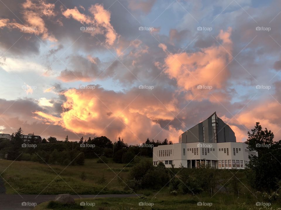 A church in the town of Kopavogur, Iceland sits quietly on a hill.  Blazing colors light up the last minutes of the day a perfect time to silently express gratitude and appreciation for life.