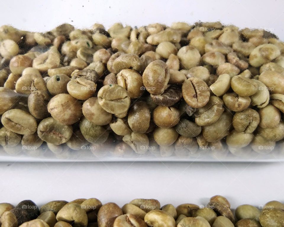 group of coffee beans on white background