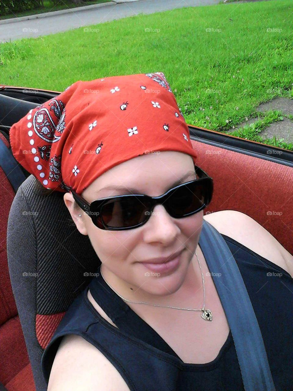 enjoying a ride in a convertible in June