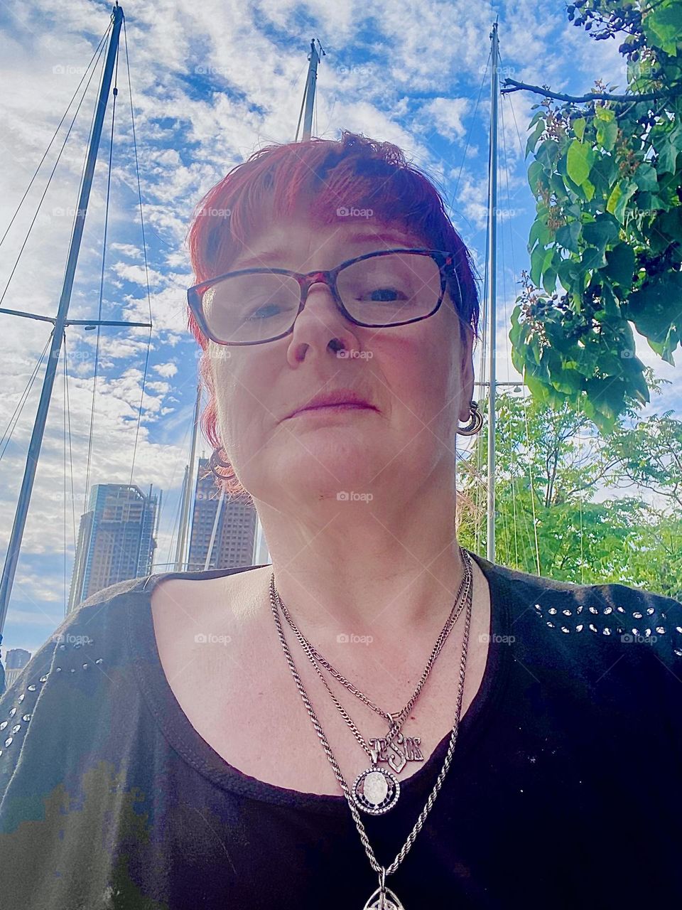 This is me, „Petra Schiller“ a.k.a. „Maxine Firefox“ enjoying a late summer afternoon that is warm but not hot aboard „Salvation“, the „1969 Luhrs“ cabin cruiser me and my partner call home here at „Newtown Creek“ in LIC. 2023. Hypnotic Productions