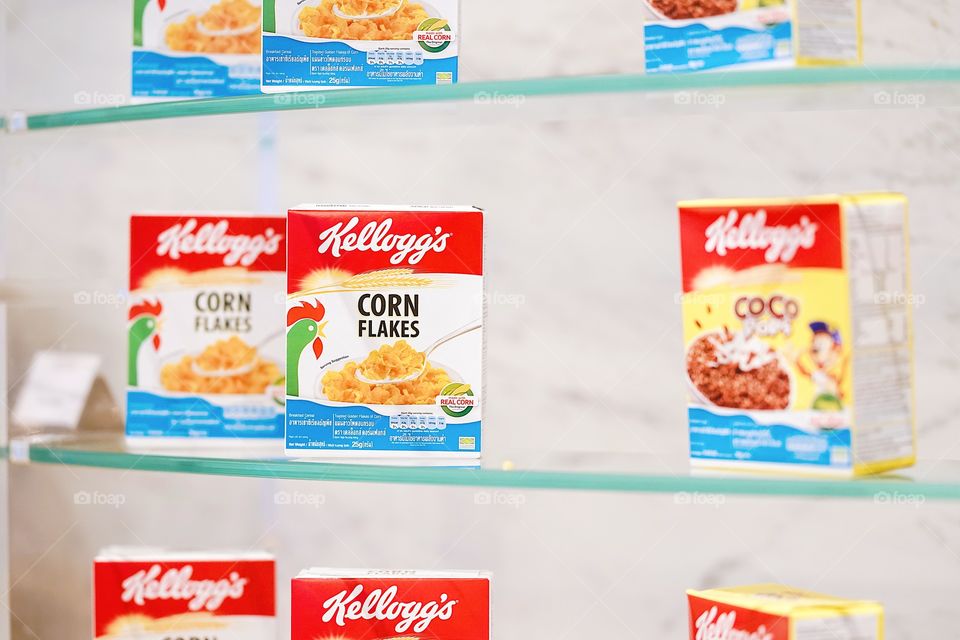 Bangkok, Thailand - May 13, 2018 : A photo of Kellogg's cornflakes boxes on shelf at Suvarnabhumi airport. Kellogg's is a American cereal brand produced by Kellogg company and distributed worldwide.